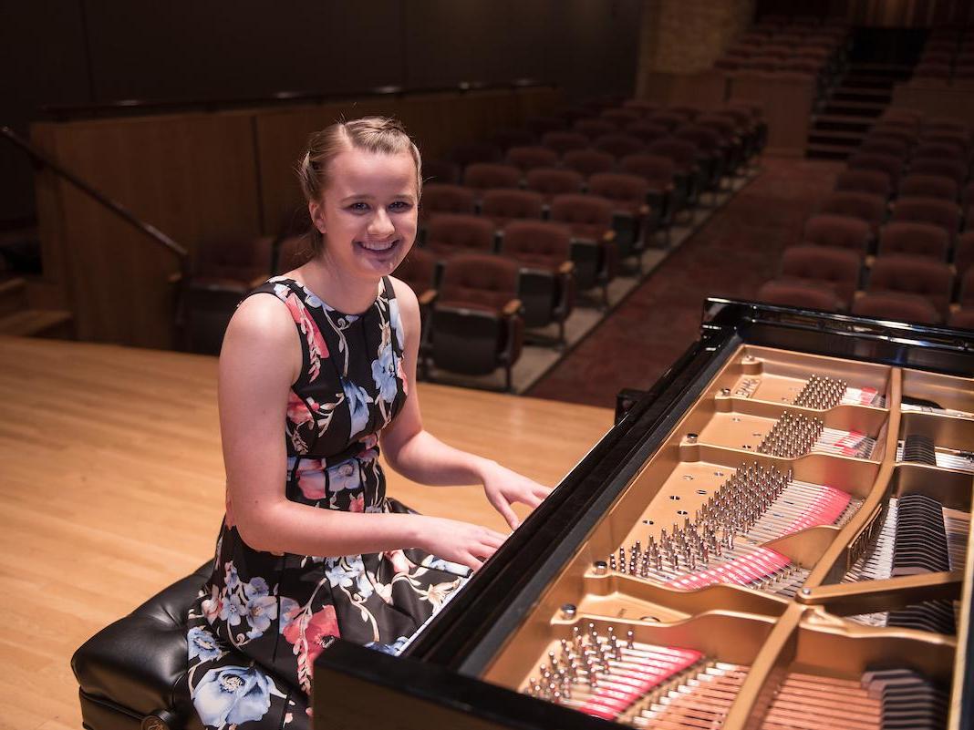 Student playing piano